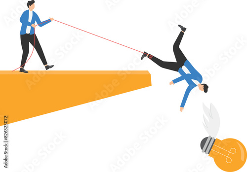 Business team trying to catch money falling from cliff, Business success and teamwork concept

