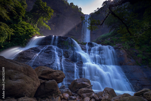 Slika na platnu Scenic view of waterfalls of Ciletuh Geopark in Sukabumi, West Java, Indonesia
