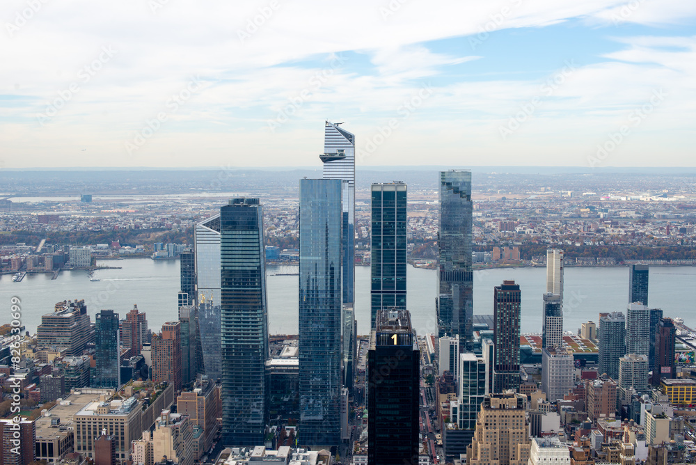 Fototapeta premium View of New york city skyline with bay and water seen from skyscrapers