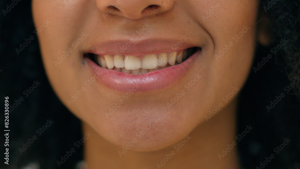Close up happy African American woman beautiful lips mouth toothy dental smile female ethnicity enjoy joyful cheerful expression teeth satisfied vitality individuality smiling healthy positive model Close up happy African American woman beautiful lips mouth toothy dental smile female ethnicity enjoy joyful cheerful expression teeth satisfied vitality individuality smiling healthy positive model