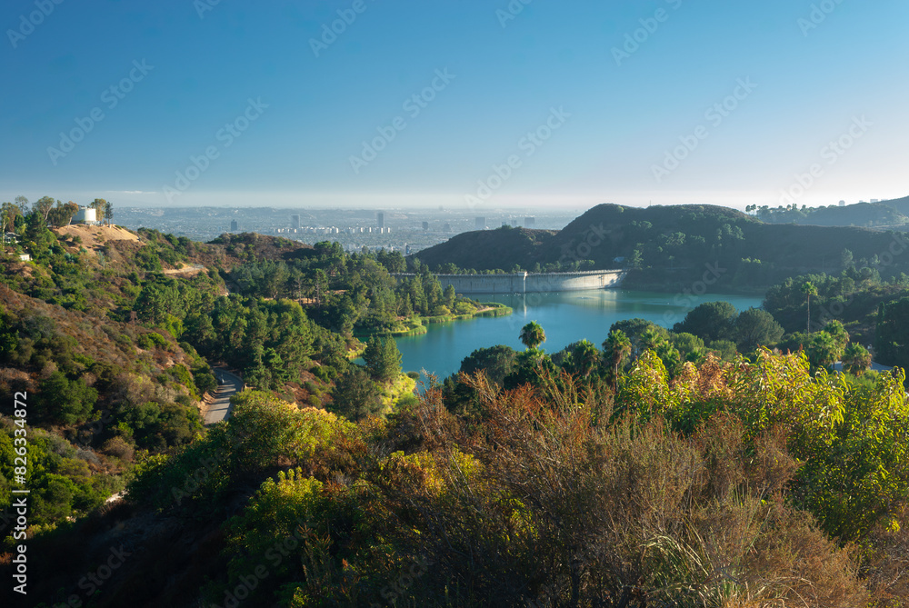 Lake Hollywood on a sunny day with a distance view of Los Angeles Lake Hollywood on a sunny day with a distance view of Los Angeles