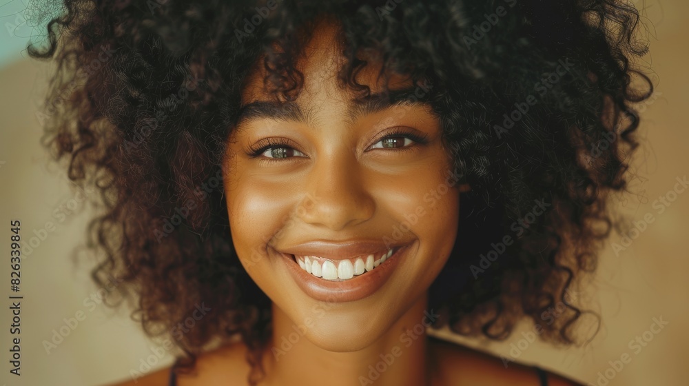 A beautiful black girl poses for a fashion magazine photoshoot. She smiles and acts playfully in a studio. These are portrait shots made in professional studios. A beautiful black girl poses for a fashion magazine photoshoot. She smiles and acts playfully in a studio. These are portrait shots made in professional studios.