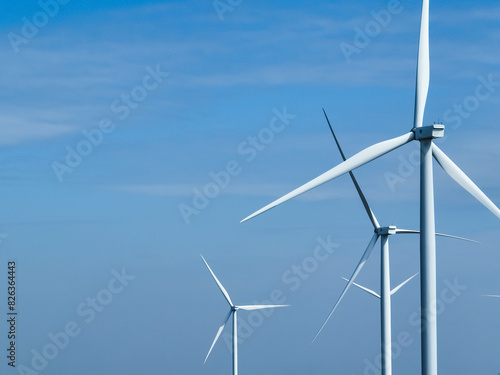 Wind energy. Wind power. Sustainable, renewable energy. Wind turbines generate electricity. Wind farm. Sustainable resources. Sustainable development. Green technology for energy sustainability. © Artinun