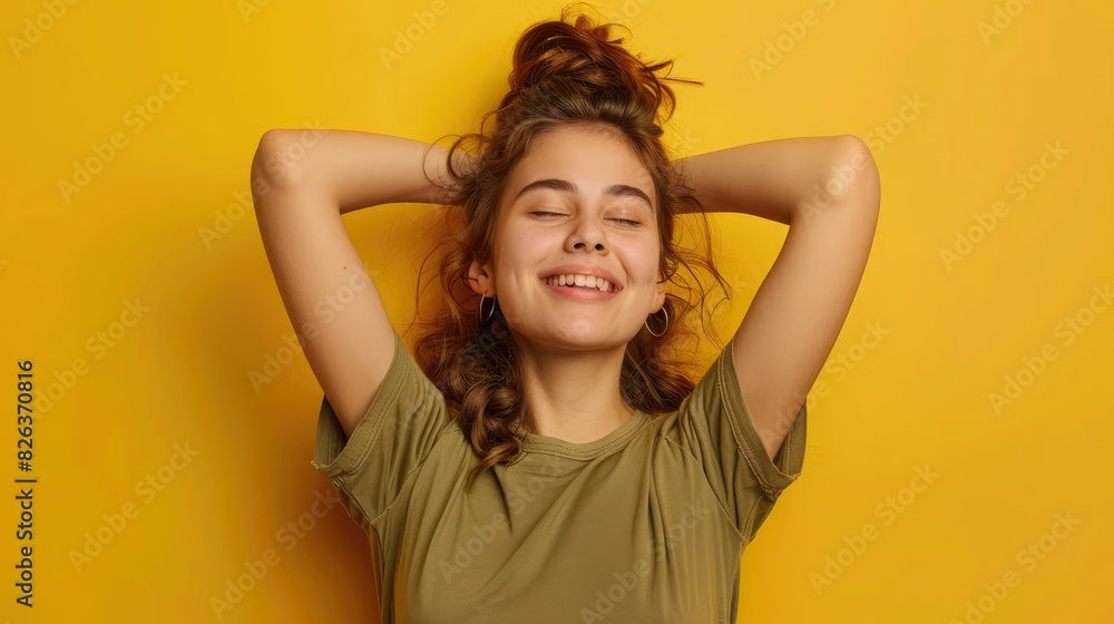 Photo of good mood adorable girl dressed stylish khaki t-shirt making wish laughing eyes closed isolated on yellow color background Photo of good mood adorable girl dressed stylish khaki t-shirt making wish laughing eyes closed isolated on yellow color background