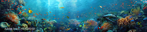Coral Reef: An underwater scene of a vibrant coral reef, teeming with colorful fish, sea turtles, and waving sea anemones photo