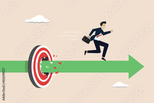 Business achievement, target success or career growth concept, confident businessman broke through success target board.