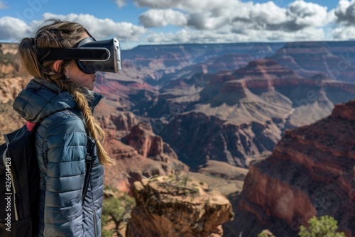 Person with virtual reality glasses on top of a canyon, canyons in the background, artificial intelligence concept, futuristic.