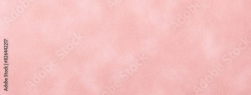 Texture of pink old paper, crumpled background. Vintage rose grunge surface. Matt velvet textile backdrop.