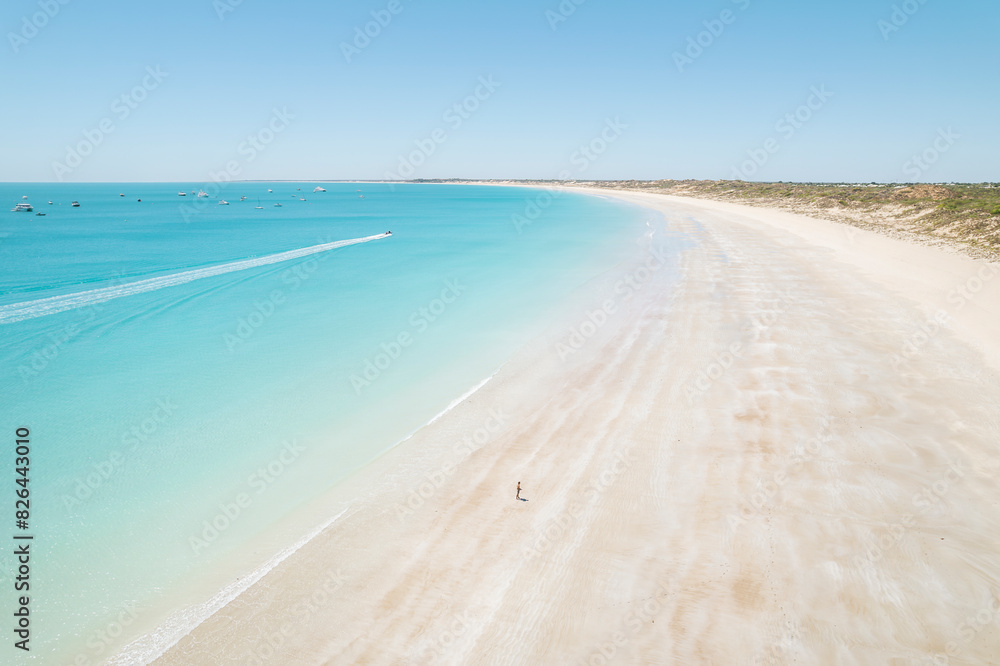Aerial view of turquoise waters and sandy beach at Cable Beach, Western Australia, Australia. Aerial view of turquoise waters and sandy beach at Cable Beach, Western Australia, Australia.