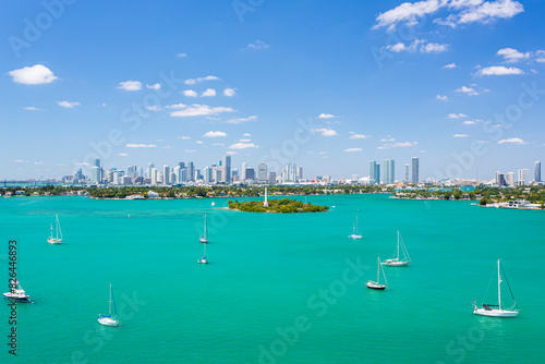 Aerial view of sandy beach and skyscrapers along Biscayne Bay, Monument Island, Miami Beach, Florida, United States.