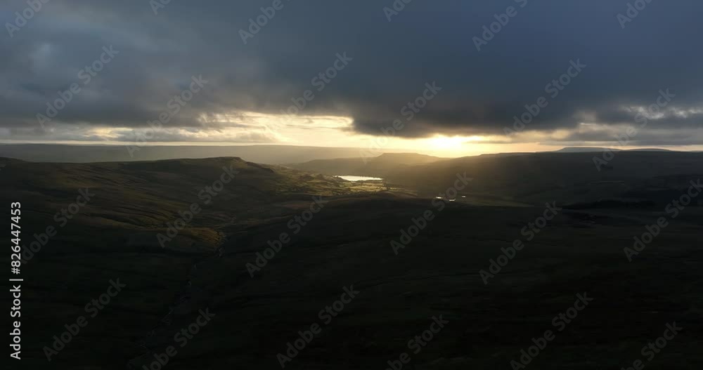 Aerial shot of sunrays breaking through the clouds Aerial shot of sunrays breaking through the clouds