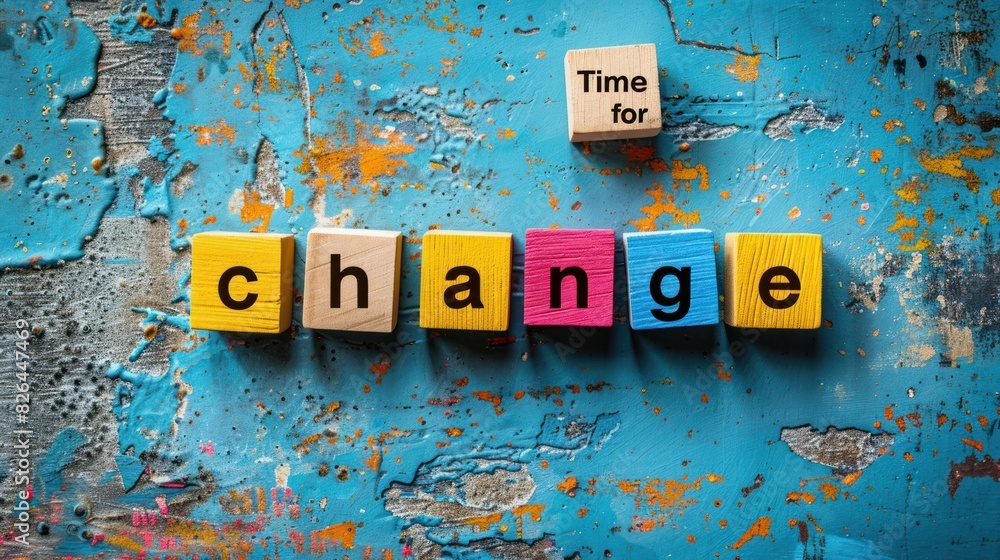 Time for change. The word change is spelled out using Scrabble blocks ...