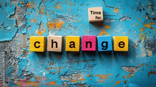 Time for change. The word change is spelled out using Scrabble blocks on a surface, creating a message of transformation and transition photo