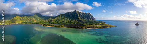 Aerial view of beautiful coastal cliffs and mountains in Kualoa, Oahu, United States. photo