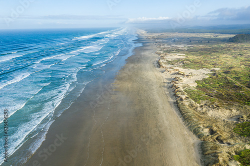Aerial view of sandy beach and blue ocean, Houhora, Northland, New Zealand. photo