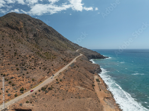 Aerial view of desert landscape with sand dunes and road, Cabo de Gata National Park, Andalusia, Spain. photo