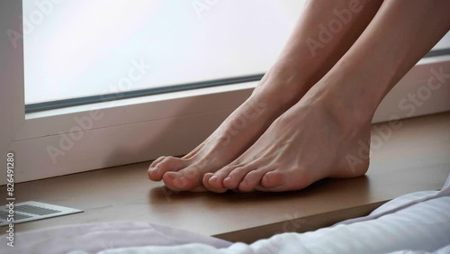 Wallpaper Mural Barefoot woman enjoying time at home, closeup Torontodigital.ca