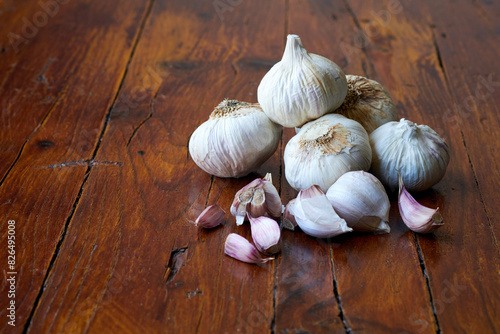 A Pile of Garlic on a Wooden Table