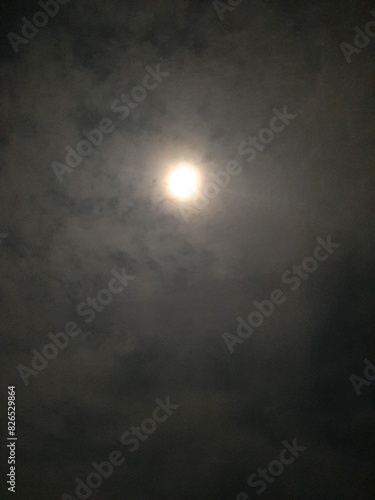 moon rays through clouds