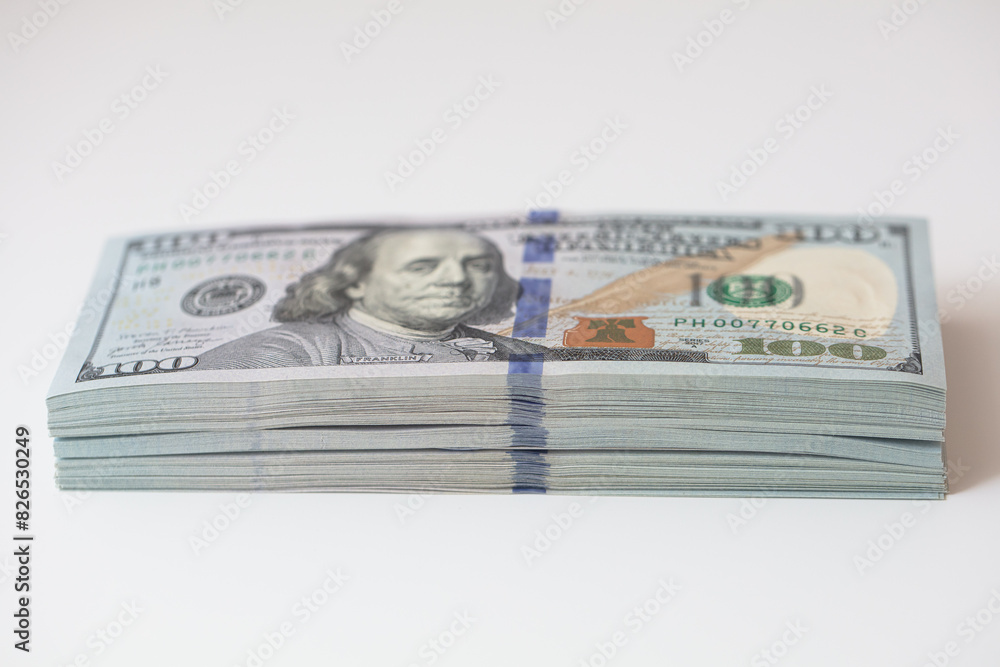 Pile of US 100 dollar banknotes Pile of US 100 dollar banknotes