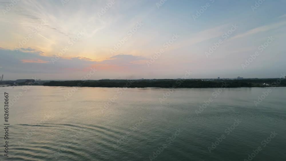 Cruise ship arriving at Port Klang Cruise Terminal early in the morning during sunrise, Pelabuhan Klang, Selangor, Malaysia Cruise ship arriving at Port Klang Cruise Terminal early in the morning during sunrise, Pelabuhan Klang, Selangor, Malaysia