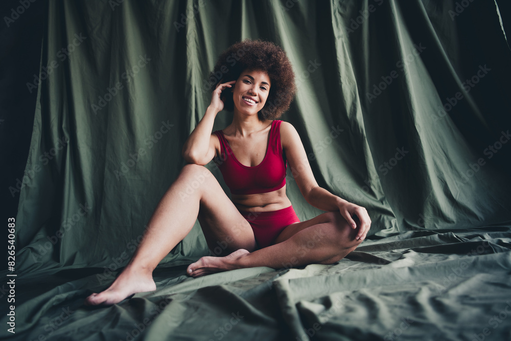 Unretouched photo of happy girl sit green linen feel body positive isolated background Unretouched photo of happy girl sit green linen feel body positive isolated background
