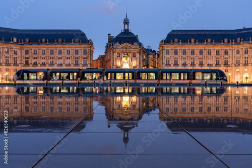 Photography Tram at the Miroir D’eau, Place de la Bourse at blue hour, Bordeaux, Gironde, Aq