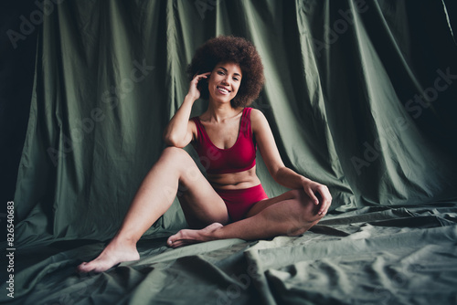 Unretouched photo of happy girl sit green linen feel body positive isolated background