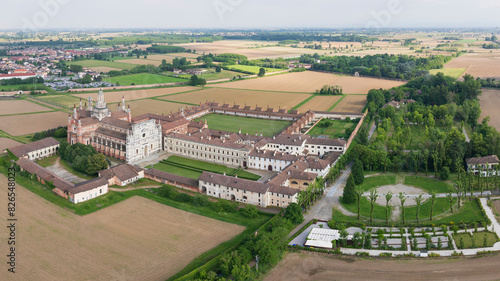 Aerial shot of Certosa di Pavia cathedral a historical monumental complex that includes a monastery and a sanctuary. Pavia ,Italy.