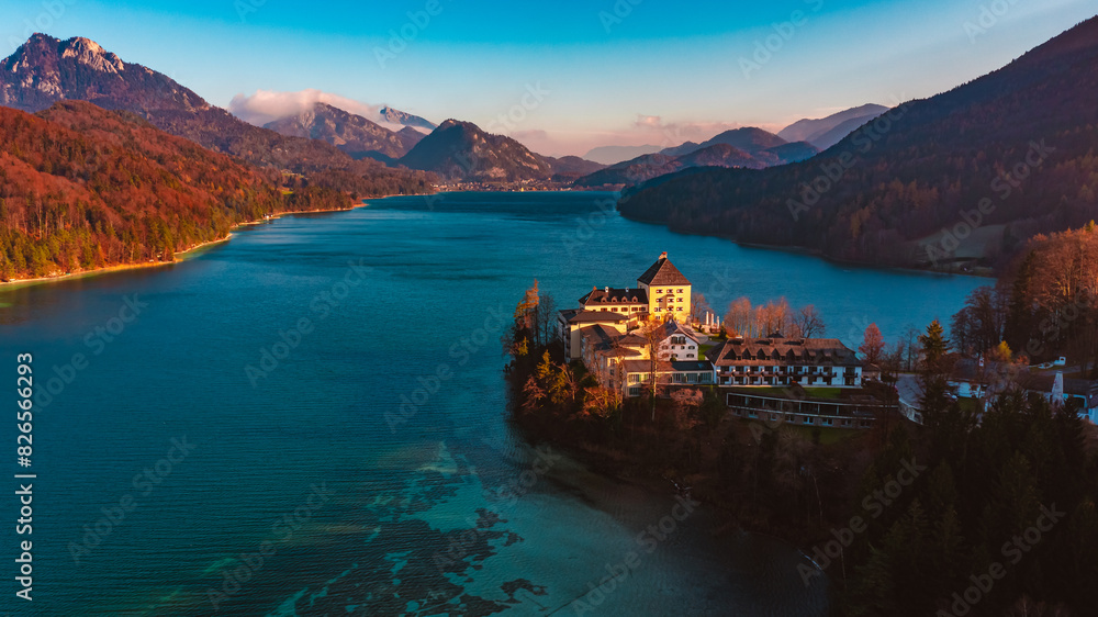 Fototapeta premium Aerial View of Schloss Fuschl on Fuschlsee in Autumn, Scenic Castle and Lake Landscape in Salzburg, Austria