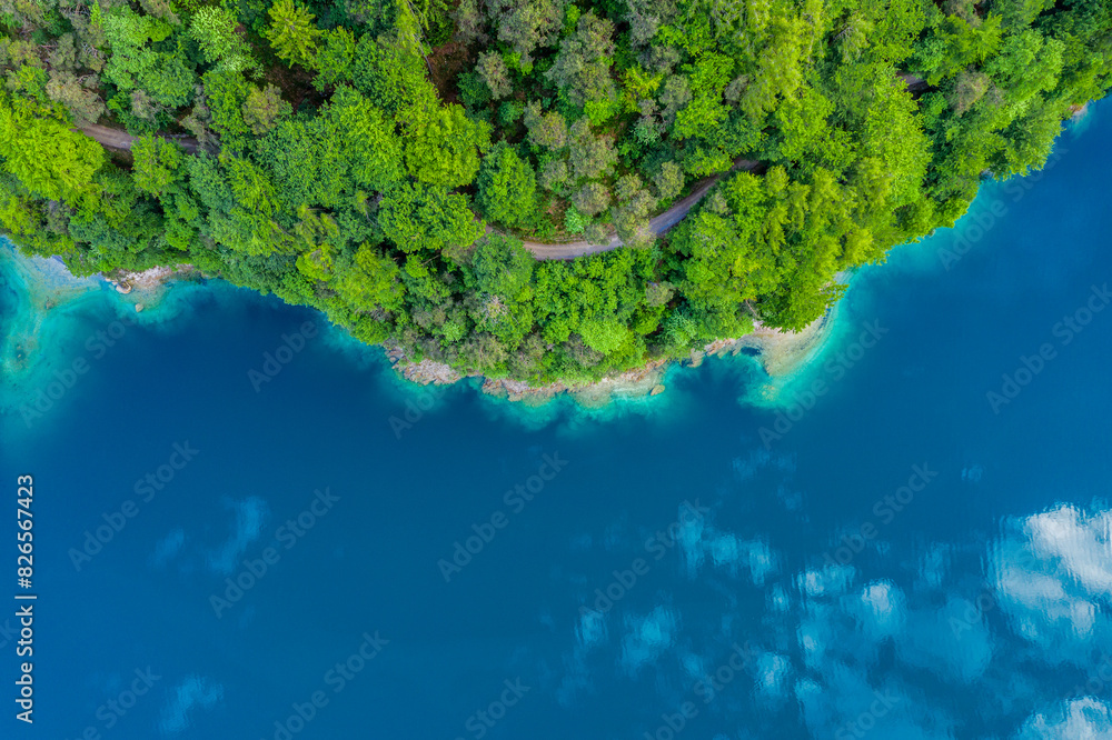 Aerial View of Lago di Ledro in Italy, Scenic Turquoise Waters and Forested Shoreline