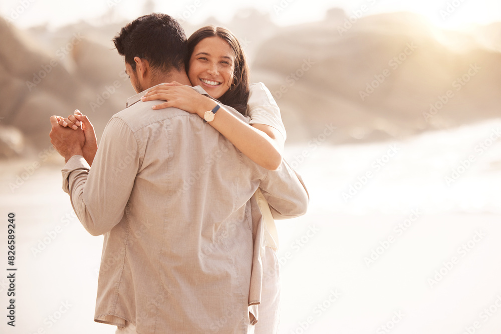 Portrait, happy couple and dancing at beach on vacation, summer holiday or travel outdoor together. Hug, man and woman holding hands at sea for love, support or connection for romantic date at ocean Portrait, happy couple and dancing at beach on vacation, summer holiday or travel outdoor together. Hug, man and woman holding hands at sea for love, support or connection for romantic date at ocean