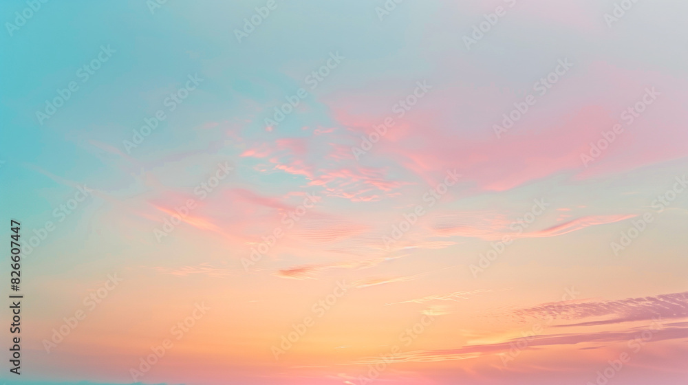 Obraz premium Serene Pastel Sky at Sunrise with Soft Spreading Colors of Pink, Blue, and Yellow Creating a Tranquil Morning Scene