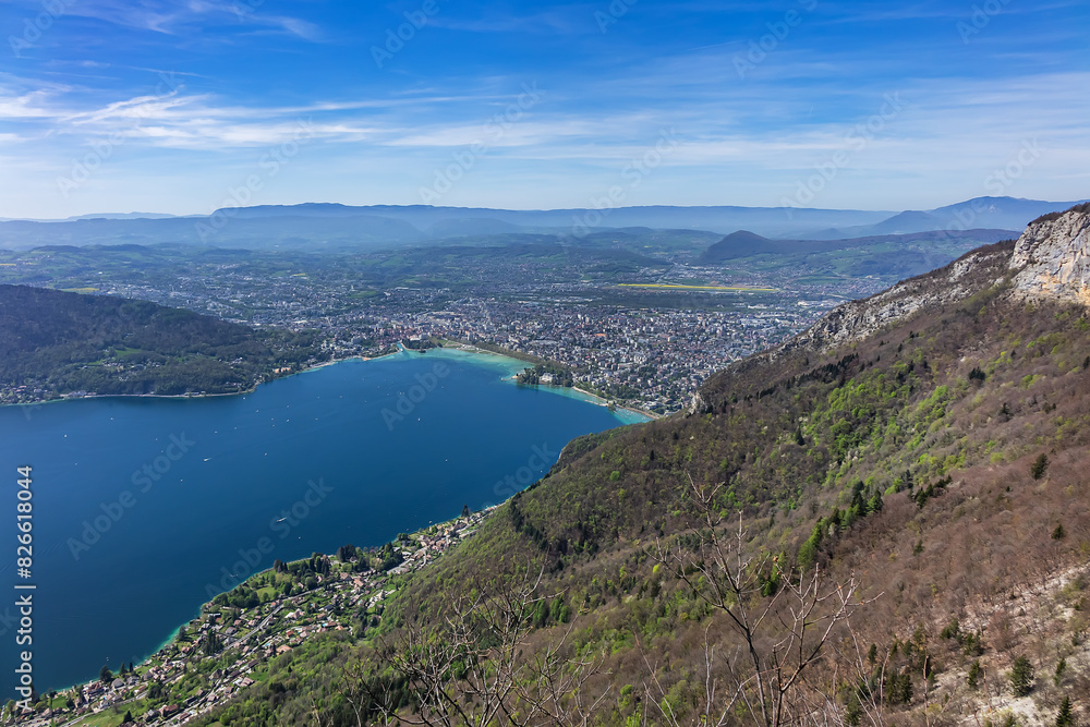 Wonderful views on a walk above the picturesque Lake Annecy. Route along the ridge from Mont Veyrier to Mont Baron from Annecy. Annecy, Haute-Savoie, France. Wonderful views on a walk above the picturesque Lake Annecy. Route along the ridge from Mont Veyrier to Mont Baron from Annecy. Annecy, Haute-Savoie, France.