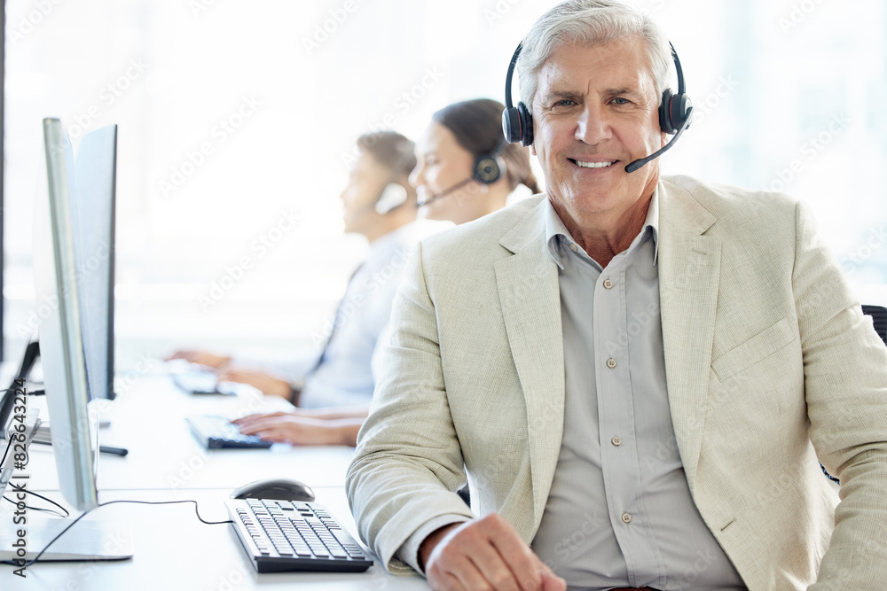 Happy, portrait and mature man in call center to help in customer support to chat online on computer. Advisor, consultant and contact us in telemarketing phone call for solution and virtual service Happy, portrait and mature man in call center to help in customer support to chat online on computer. Advisor, consultant and contact us in telemarketing phone call for solution and virtual service