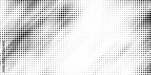 Abstract halftone dotted background. Grunge effect vector texture 