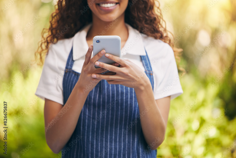 Young, waitress and phone for typing with smile for social media, joy for news story with online community. Black woman, mobile app and happiness for message with internet, post or like on website Young, waitress and phone for typing with smile for social media, joy for news story with online community. Black woman, mobile app and happiness for message with internet, post or like on website