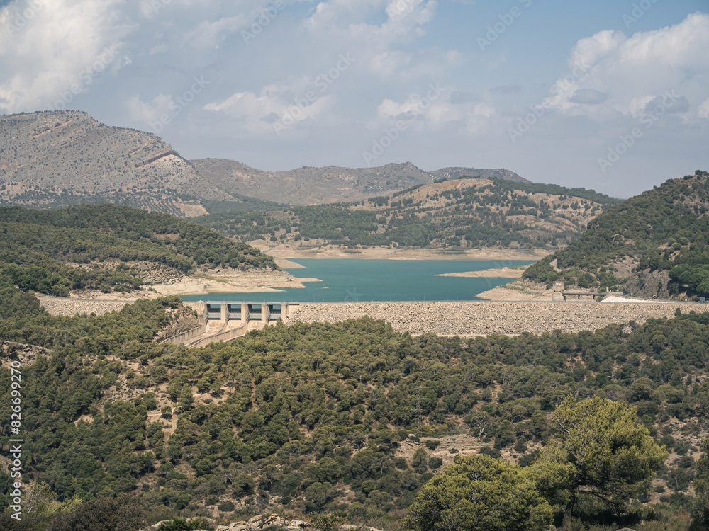 Obraz premium View of the dam of a hydroelectric power plant on the Guadalhorce - Guadalteba Reservoir in Southern Spain, Andalusia, near Malaga
