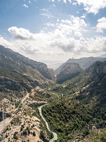 An overlook aerial view of the El Caminito Del Rey hiking route in the canyon of the Guadalhorce river, as seen from the Mirador De Las Buitreras lookout point photo