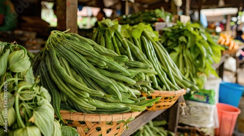 Parkia speciosa or bitter bean available for purchase at a traditional marketplace photo
