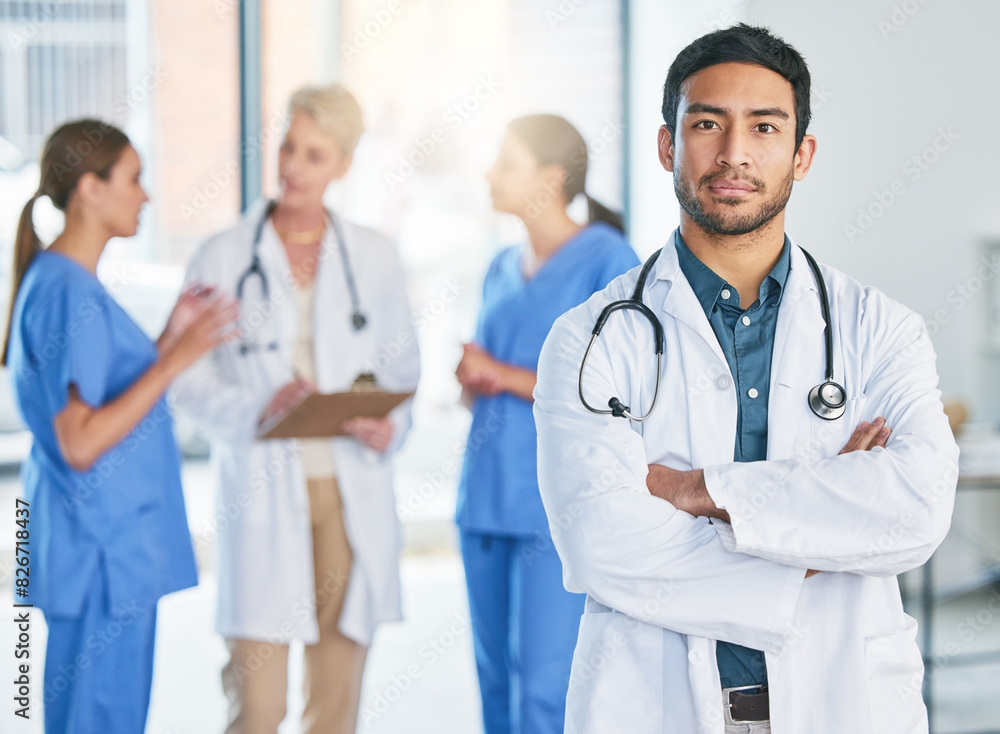 Man, doctor and portrait with arms crossed in hospital, clinic and leadership of surgery team. Cardiology, surgeon and consulting with person with trust in expert, service and healthcare management Man, doctor and portrait with arms crossed in hospital, clinic and leadership of surgery team. Cardiology, surgeon and consulting with person with trust in expert, service and healthcare management