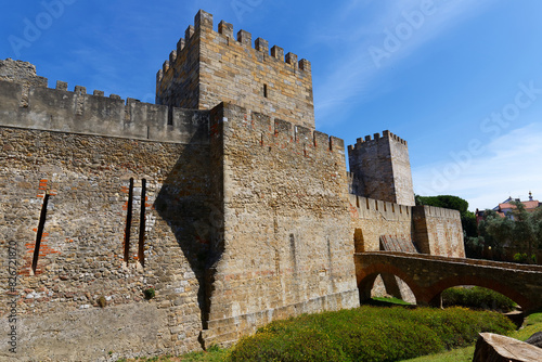 Part of the high stone masonry defense wall, of the 11th-century, hilltop Moorish Saint George castle or Castelo de S. Jorge Lisbon, Portugal