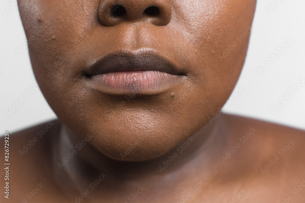 Obraz premium Brown skinned woman with even skin tone, dark skin woman with glowing radiant skin, beautiful brown skin girl