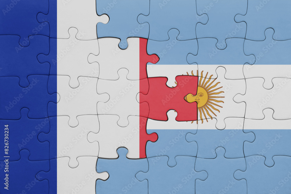 puzzle with the colourful national flag of argentina and flag of france. puzzle with the colourful national flag of argentina and flag of france.