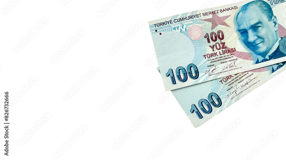 A close-up of two 100 Turkish Lira banknotes on a white background. This image is ideal for financial concepts, business, currency exchange, and banking promotions, with a clean presentation and ample A close-up of two 100 Turkish Lira banknotes on a white background. This image is ideal for financial concepts, business, currency exchange, and banking promotions, with a clean presentation and ample