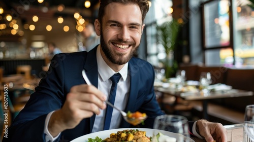 Cheerful businessman eating food in restaurant