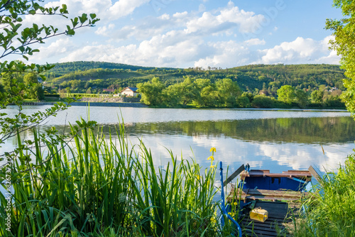 Beautiful views of the river Berounka a Wooden boats in the spring season. Czech photo