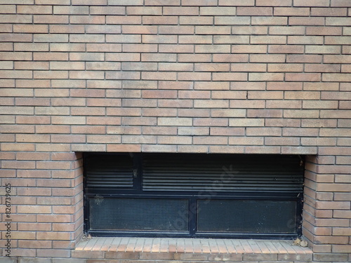 brick wall with a window