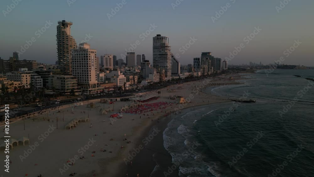 Drone shot showing the sea and the beach in Tel Aviv. Drone shot showing the sea and the beach in Tel Aviv.