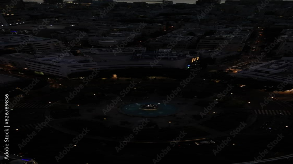 Drone shot of a roundabout at night. Drone shot of a roundabout at night.